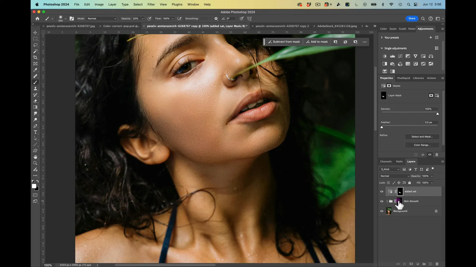 applying a surface blur to smooth skin on woman's face